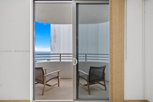 Building Photo - 5555 Collins Ave