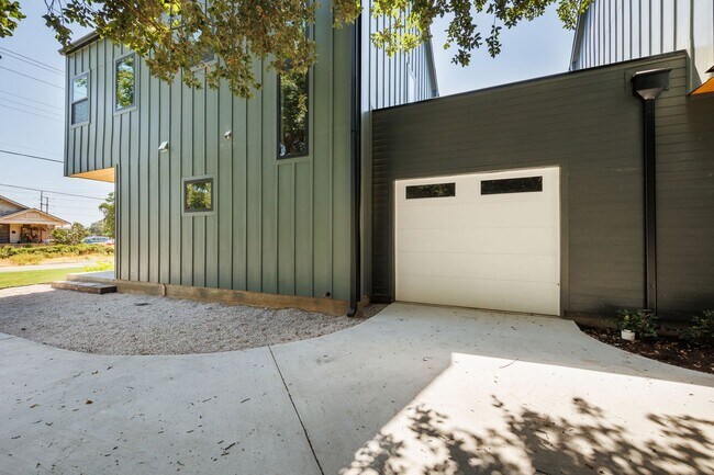 Building Photo - Luxury Redefined: Experience Vibrant Living in this 3-Bedroom Haven in East Austin