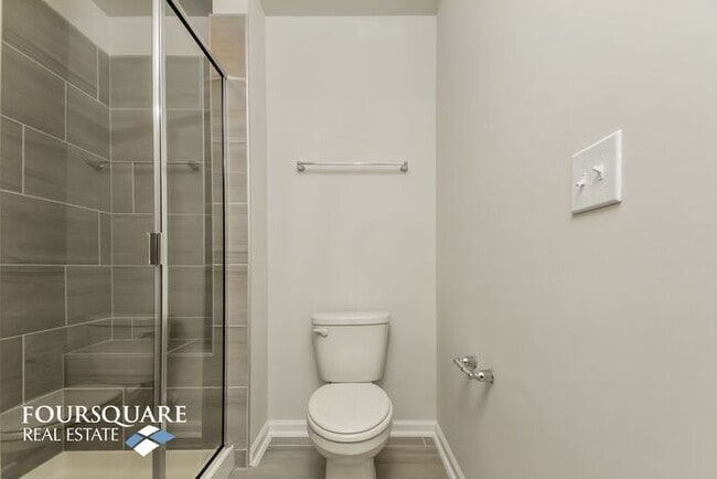 Building Photo - Modern 3-Story Townhome with First-Level B...