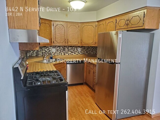 Building Photo - 8442 N Servite Dr