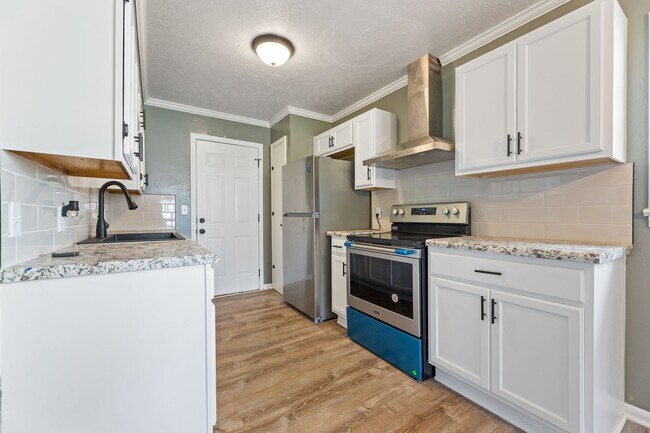 Building Photo - 4655 Curtis Ave