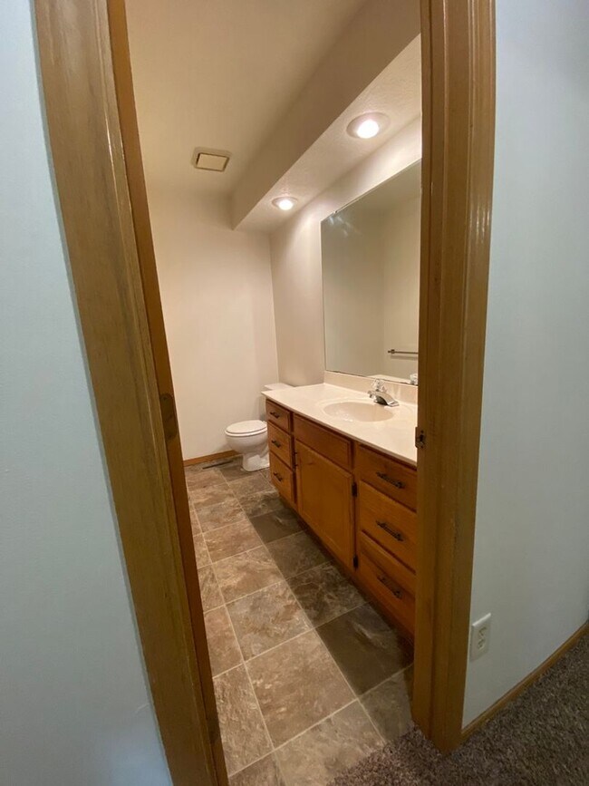 Building Photo - Three bedroom, two bathroom, two car garag...