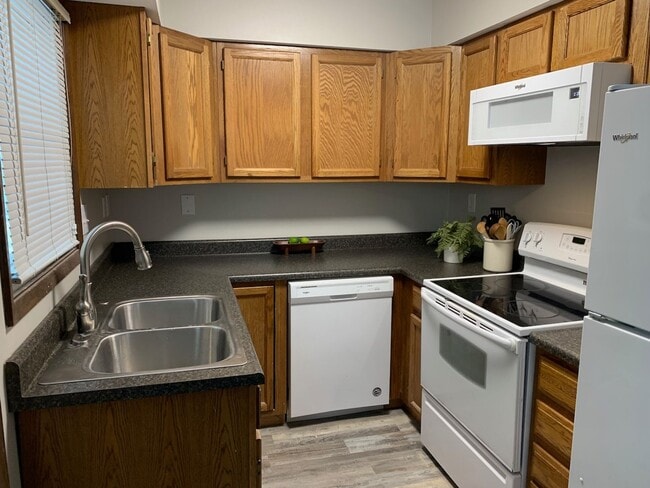 Building Photo - Updated 2BR/1.5BA with garage, lawn care included