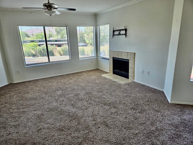 Living Room w/ Firreplace - 7575 E Indian Bend Rd