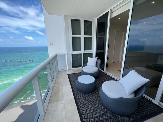 Building Photo - 18201 Collins Ave