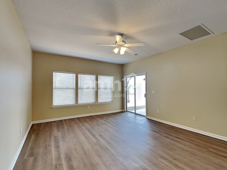 Building Photo - 7117 Rapid River Dr W