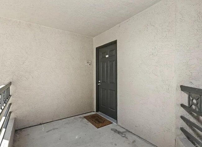 Building Photo - 7565 Charmant Dr