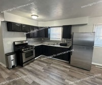 Building Photo - Discover comfort, convenience, and quality living in this beautifully updated 3-bedroom single-fa...