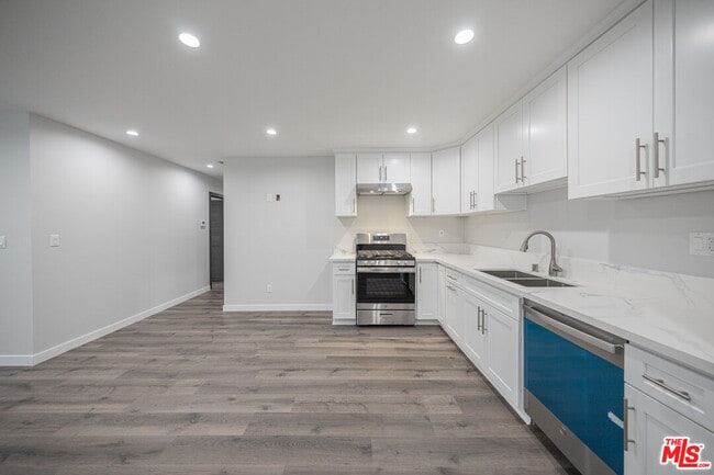 Building Photo - 5837 Cartwright Ave