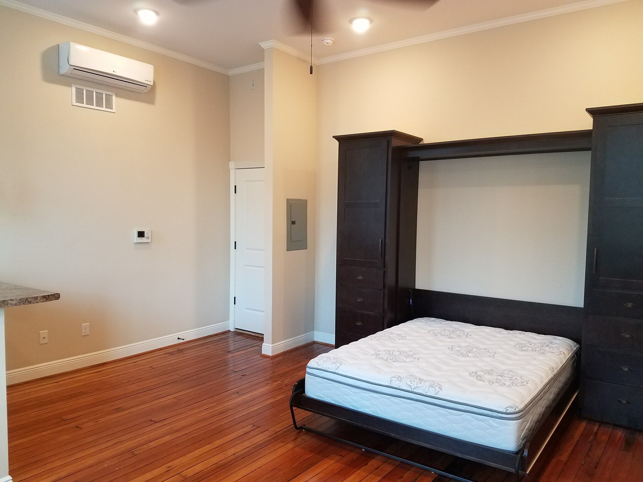 Murphy Bed for Space Saving Beauty - 114 E University St
