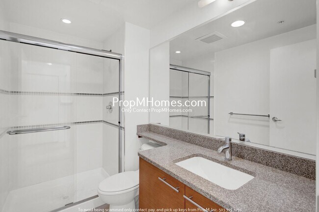 Building Photo - Modern 2-Bedroom, 2-Bath Condo with Stunni...