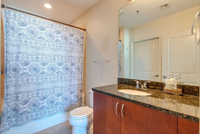 Building Photo - Downtown Luxury Living at The Encore