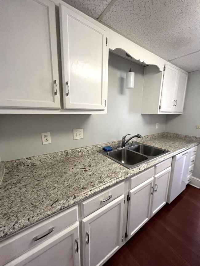 Building Photo - RENT SPECIAL! Just painted, modern gray! Charming end unit town home in Stones Throw. Walking dis...