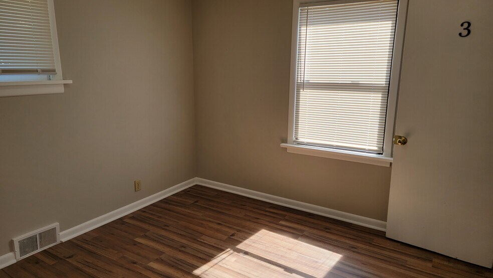 Bedroom 3 on main floor. - 12105 12th Ave S