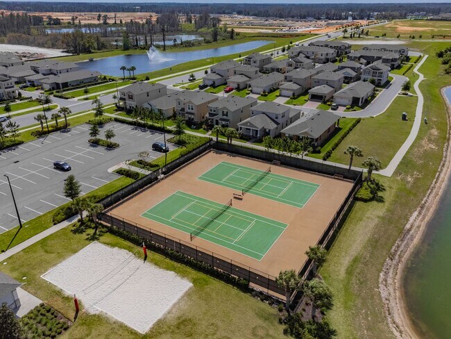 Building Photo - Resort Style Living! Stunning 3/2.5 Townhome in Waterleigh! Available April!