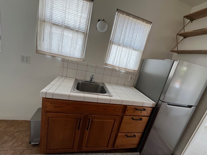 Kitchen windows, sink & fridge - 1617 California Ave