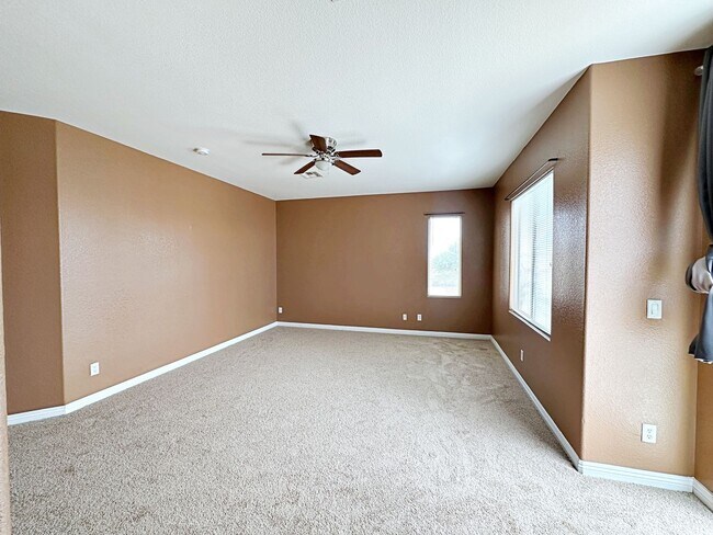 Building Photo - 4 BEDROOM HOME 3 CAR GARAGE ON A CORNER LO...