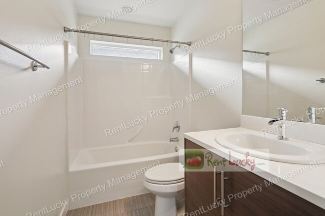 Building Photo - Immaculate and LARGE 4-Bedroom Home in Unb...