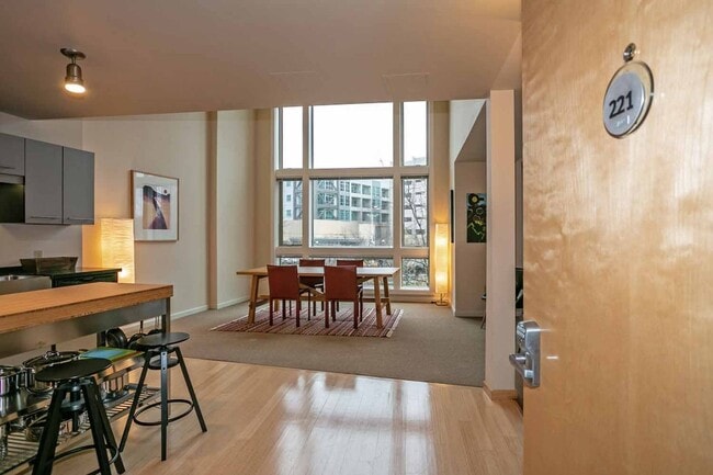 Building Photo - Gorgeous loft-style 2 floor condo with secured parking, A/C and rent includes most utilities!
