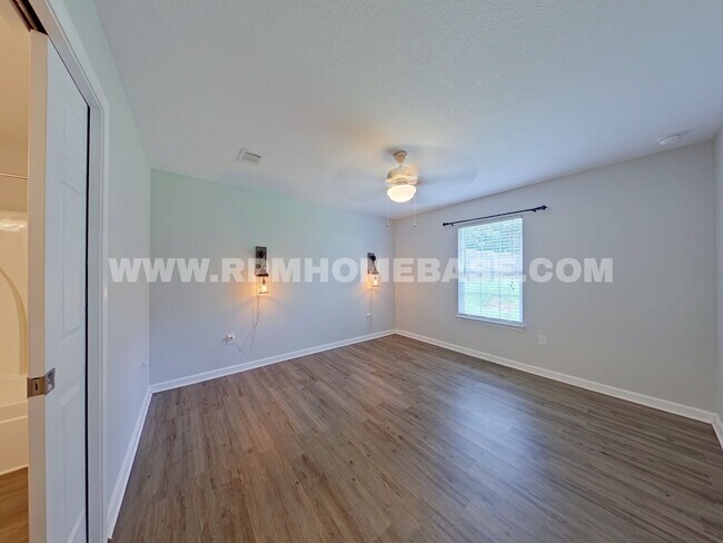 Building Photo - Your Baker Sanctuary with Spacious Backyar...