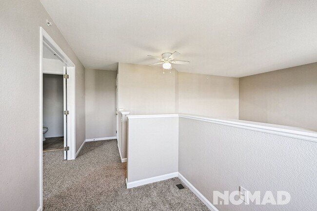 Building Photo - Spacious 3-Bed, 2-Bath Townhome with Garag...