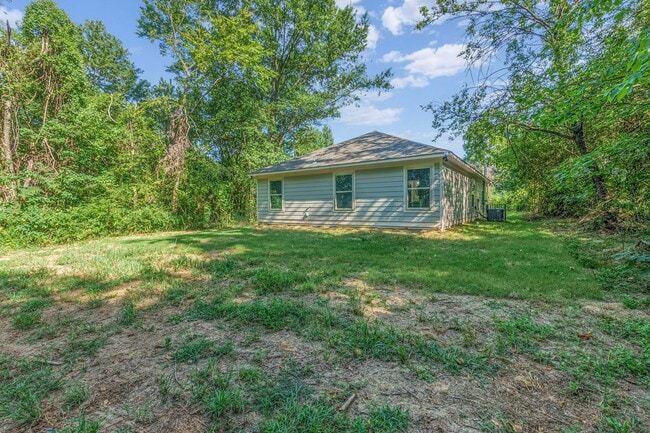 Building Photo - Spacious Four-Bedroom Two-Bath Home on One...