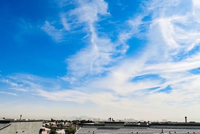 Building Photo - Unique condo with rooftop Strip Views and modern amenities.