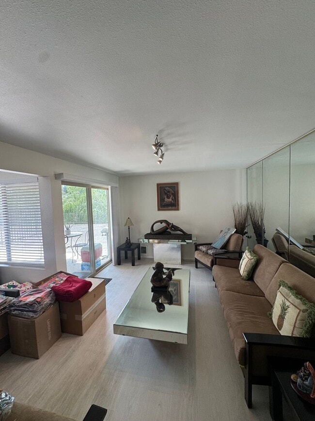 Building Photo - Gorgeous Condo in Seward Park with 2 Parking Spaces, Steps Away from Pool with Water View!