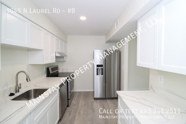 Building Photo - 9045 N Laurel Rd