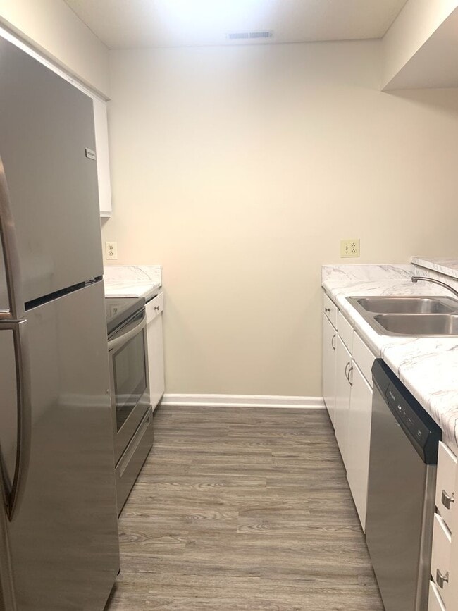 Building Photo - 720-C Powell Drive ~ 3 bedroom townhome just a short distance from the NC State Fairgrounds