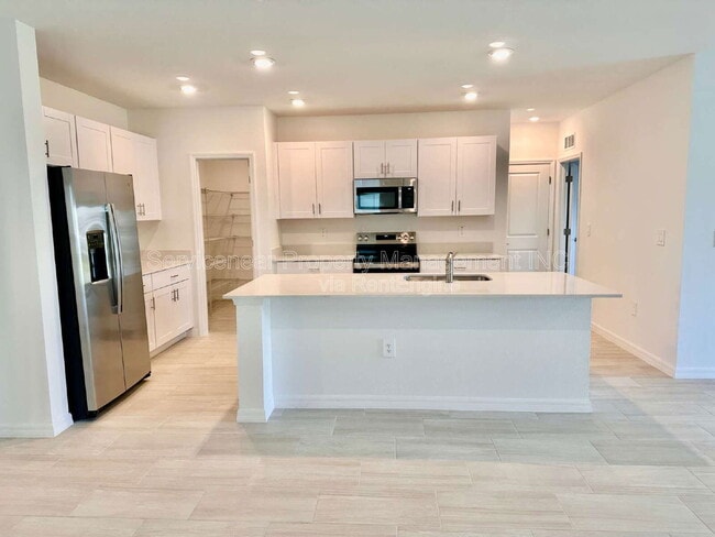 Building Photo - 8406 Blue Wave Ln E