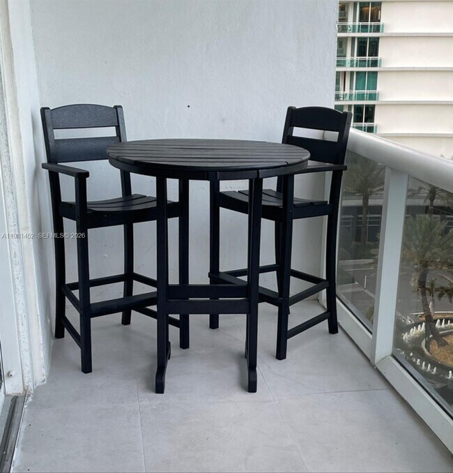 Building Photo - 10275 Collins Ave