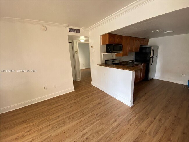 Building Photo - 241 S Royal Poinciana Blvd