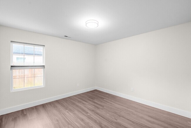 Building Photo - LIVE CLOSE TO THE ACTION — Modern 3-Bedroom Rental in Charlotte’s Reid Park!