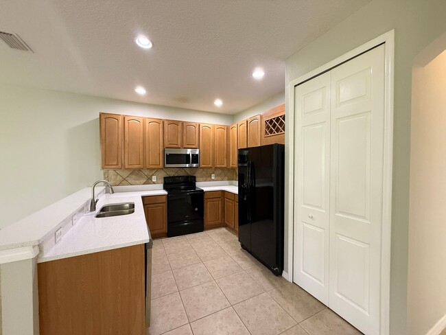 Building Photo - GORGEOUS Two Story 4/3.5 home in sought af...