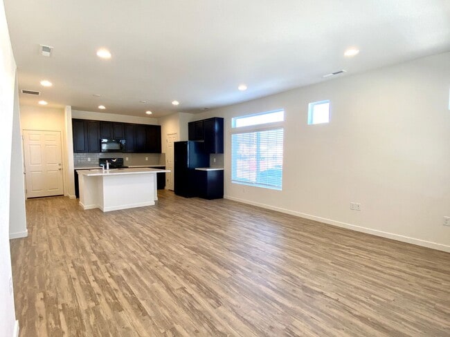 Building Photo - Beautifully built townhome in Banning Lewis Ranch ready Now!!