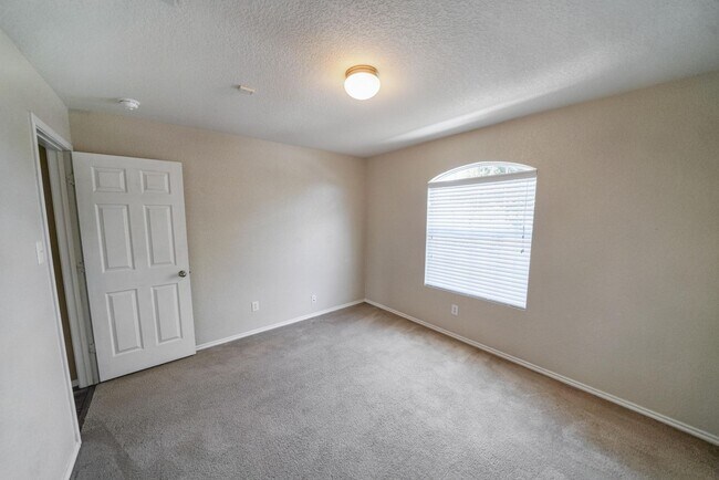 Building Photo - Energy-Smart Single-Story Now Available in...