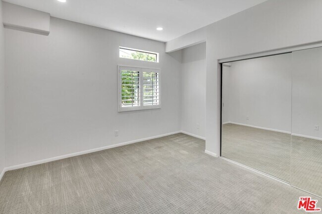 Building Photo - 4477 Woodman Ave