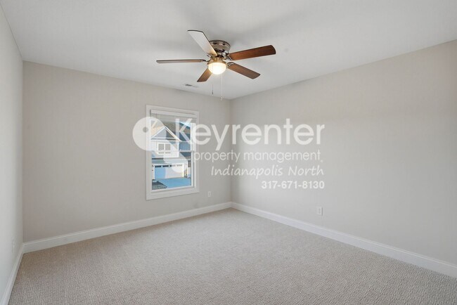 Building Photo - Located in Westfield, IN, this attractive 3-bedroom, 2.5-bath home sits on a corner lot within an...