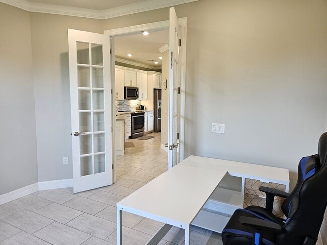 Building Photo - Stunning Model Home – 2 Bedrooms plus Den,...