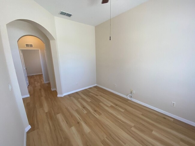 Building Photo - ANNUAL Lease – Unfurnished – Golf Course Lot - Designer Home in the highly sought-after gated com...