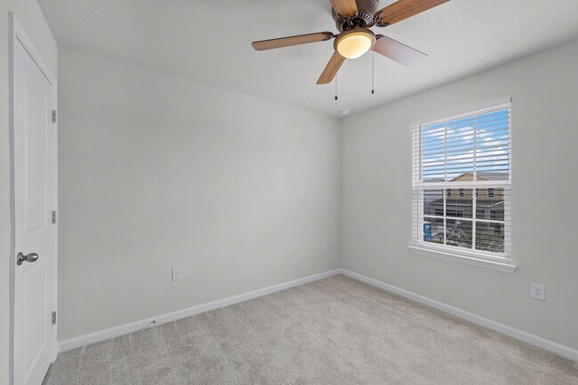 Building Photo - Brand-New 4BR Home with Tile Floors & Quar...