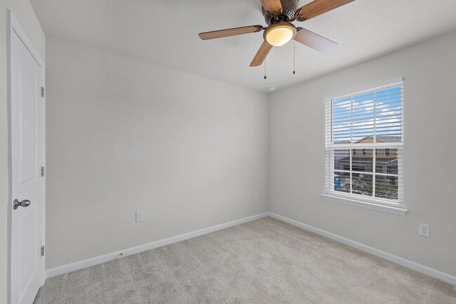 Building Photo - Brand-New 4BR Home with Tile Floors & Quartz Kitchen & Conservation Views