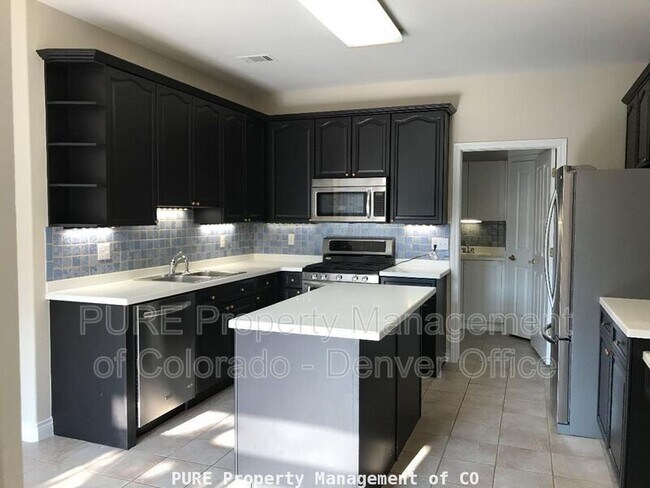 Building Photo - 9201 W Chatfield Pl