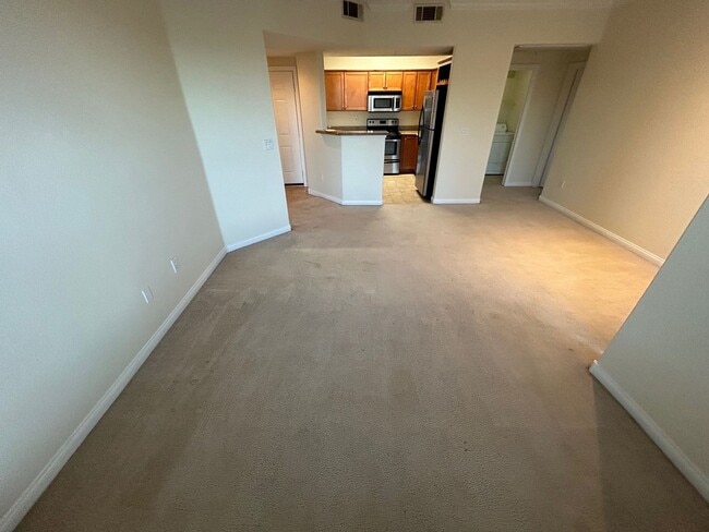 Building Photo - ADORABLE 2 BEDROOM 2 BATHROOM CONDO LOCATED IN A GATED COMMUNITY