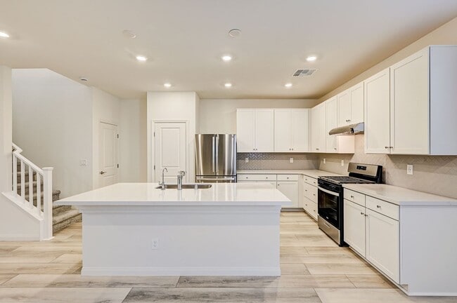 Building Photo - Beautiful two-story rental home featuring 4 bedrooms, 3 bathrooms, and a 2-car garage.