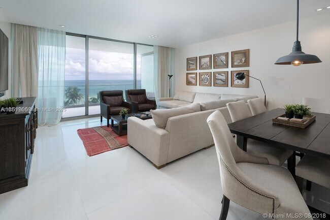 Building Photo - 10201 Collins Ave
