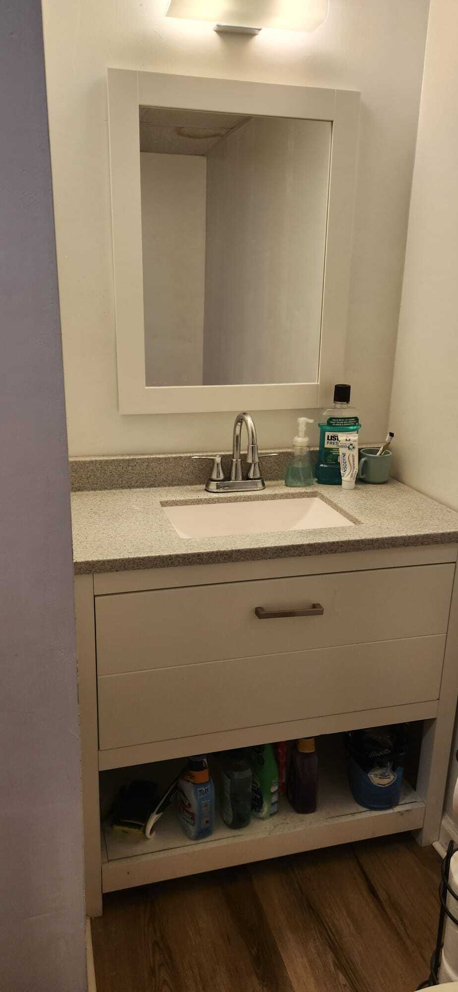 Close up of vanity in downstairs bathroom - 2116 Thaler Ave