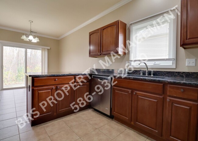 Building Photo - Ground Floor 2 BR, 2 BA condo with attache...