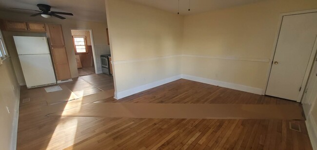 Livingroom area facing kitchen - 69 Sycamore Ave